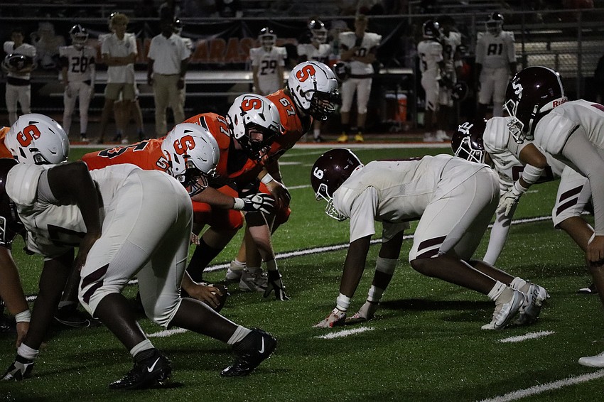 David Louis gets down in his stance at defensive end against Sarasota.