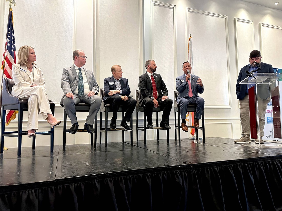 Local college presidents, from left, Michele Morgan of Keiser University, Brett Kemker, of the University of South Florida Sarasota-Manatee, Dr. Larry Thompson of Ringling College of Art & Design, Tommy Gregory of State College of Florida, and moderator Mark Gordon spoke Feb. 25 at a lunch hosted by the Lakewood Ranch Business Alliance.